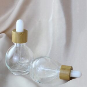 Wholesale Empty Luxury Empty 10ml 30ml 1oz Ball Shaped Clear Glass Cosmetic Serum Oil Bottle with Bamboo Dropper