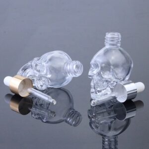 Wholesale Empty Clear Skull Shape Essential Oil 10ml 1/3 Oz Custom Glass Bottle for Cosmetic Packaging